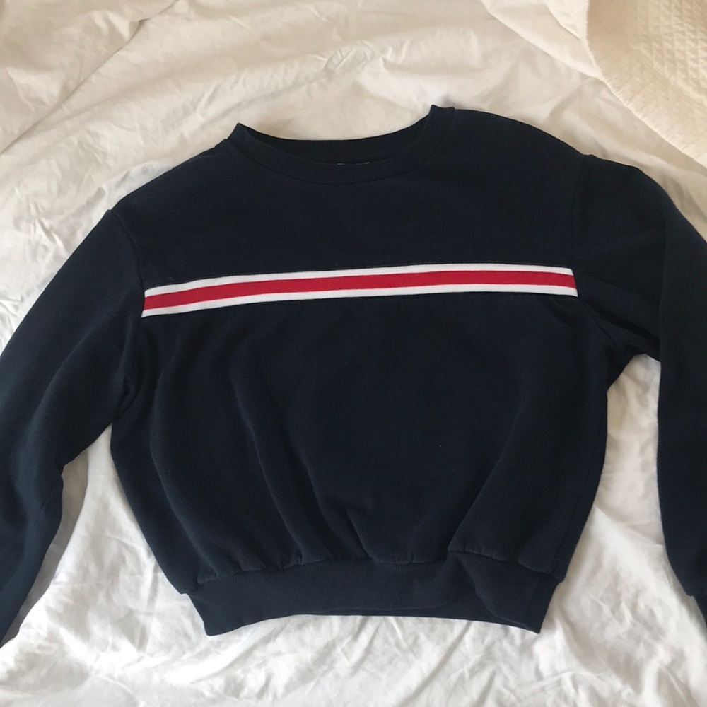 Navy blue sweatshirt- red, white design line